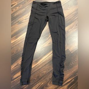 Lululemon 7/8 leggings. Side ruched detail on lower outsides. Size 8. EUC
